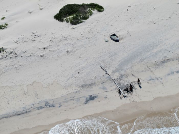Fishers camped out on the beach.